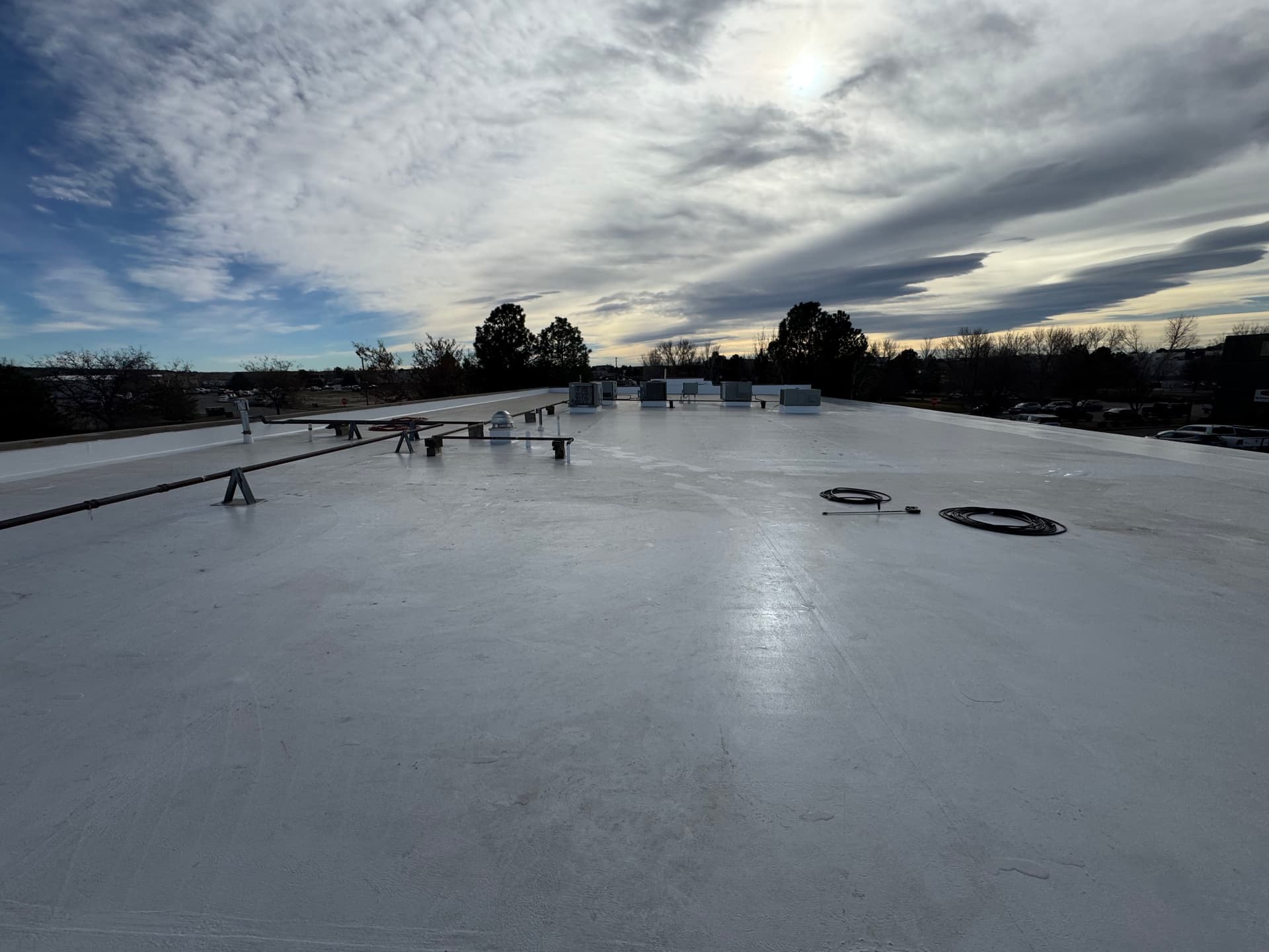 Gallery photos for Silicone Roof Coating Stops Multiple Leaks at Equipment Share HQ: Image #9
