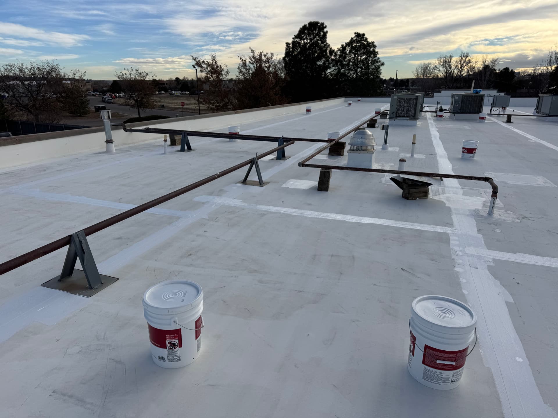 Gallery photos for Silicone Roof Coating Stops Multiple Leaks at Equipment Share HQ: Image #3