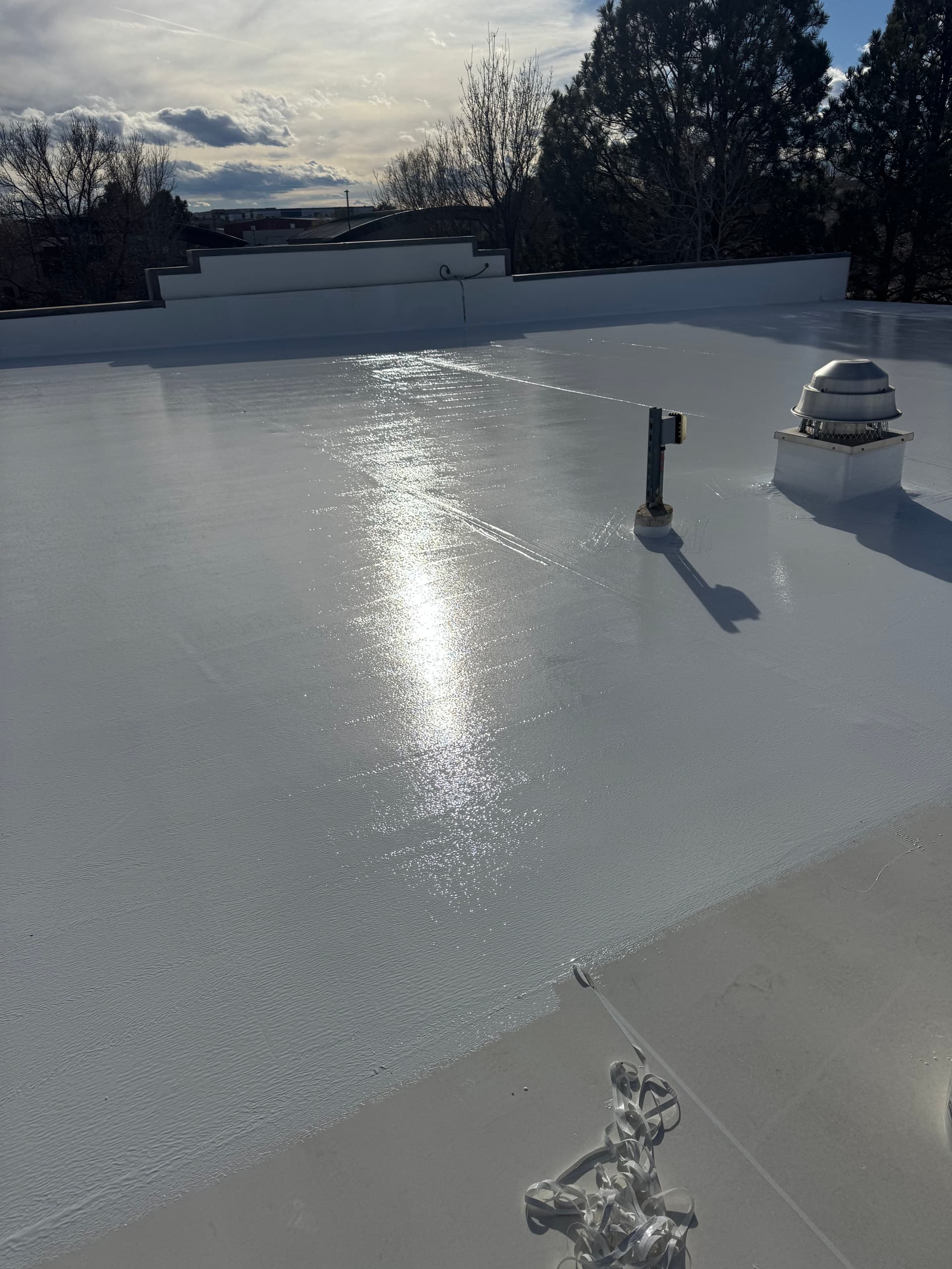 Gallery photos for Silicone Roof Coating Stops Multiple Leaks at Equipment Share HQ: Image #6