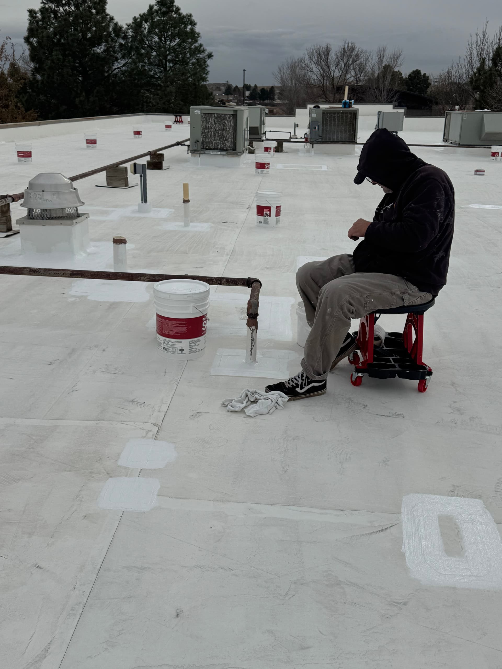 Silicone Roof Coating Stops Multiple Leaks at Equipment Share HQ image