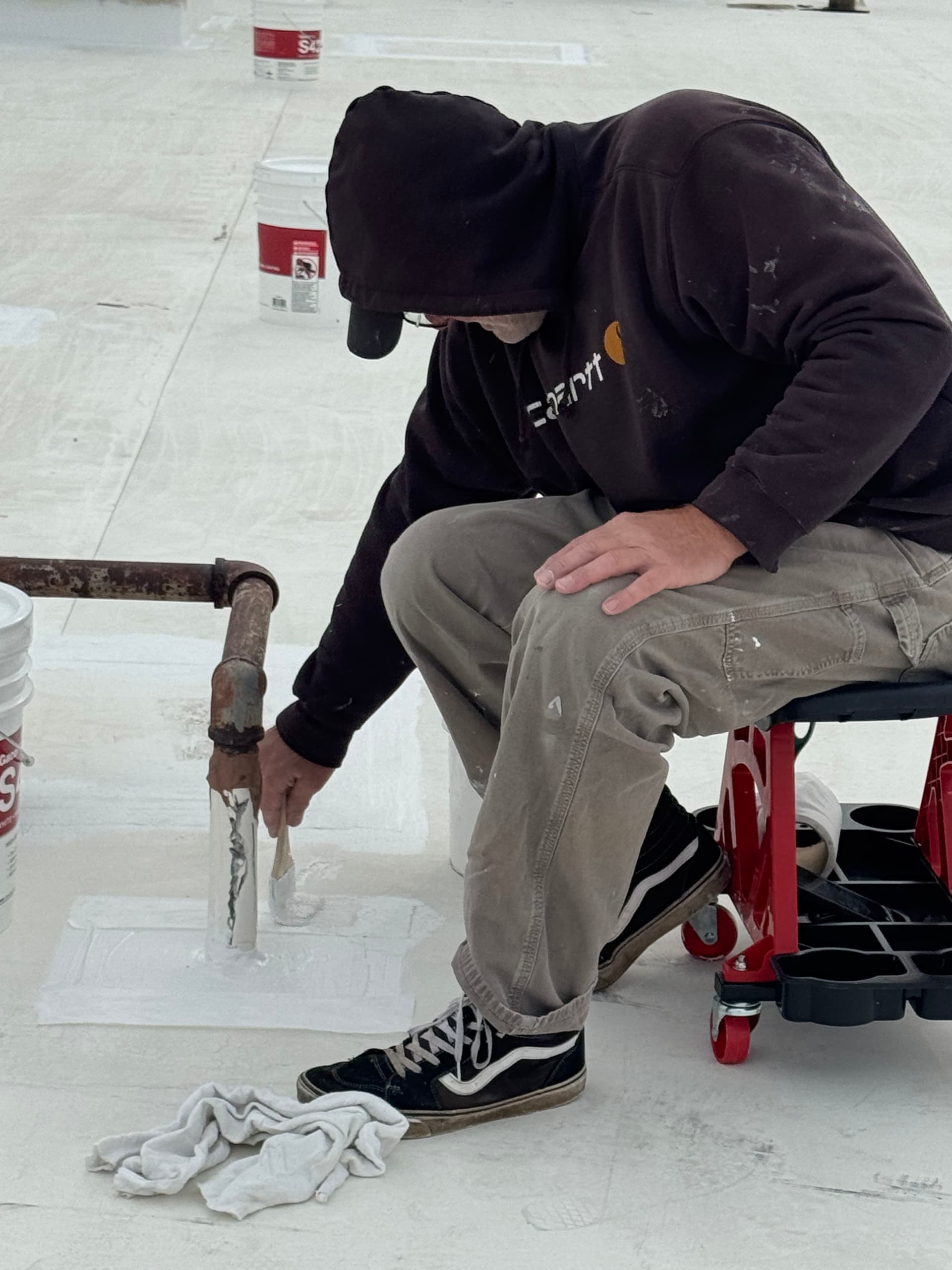 Gallery photos for Silicone Roof Coating Stops Multiple Leaks at Equipment Share HQ: Image #1