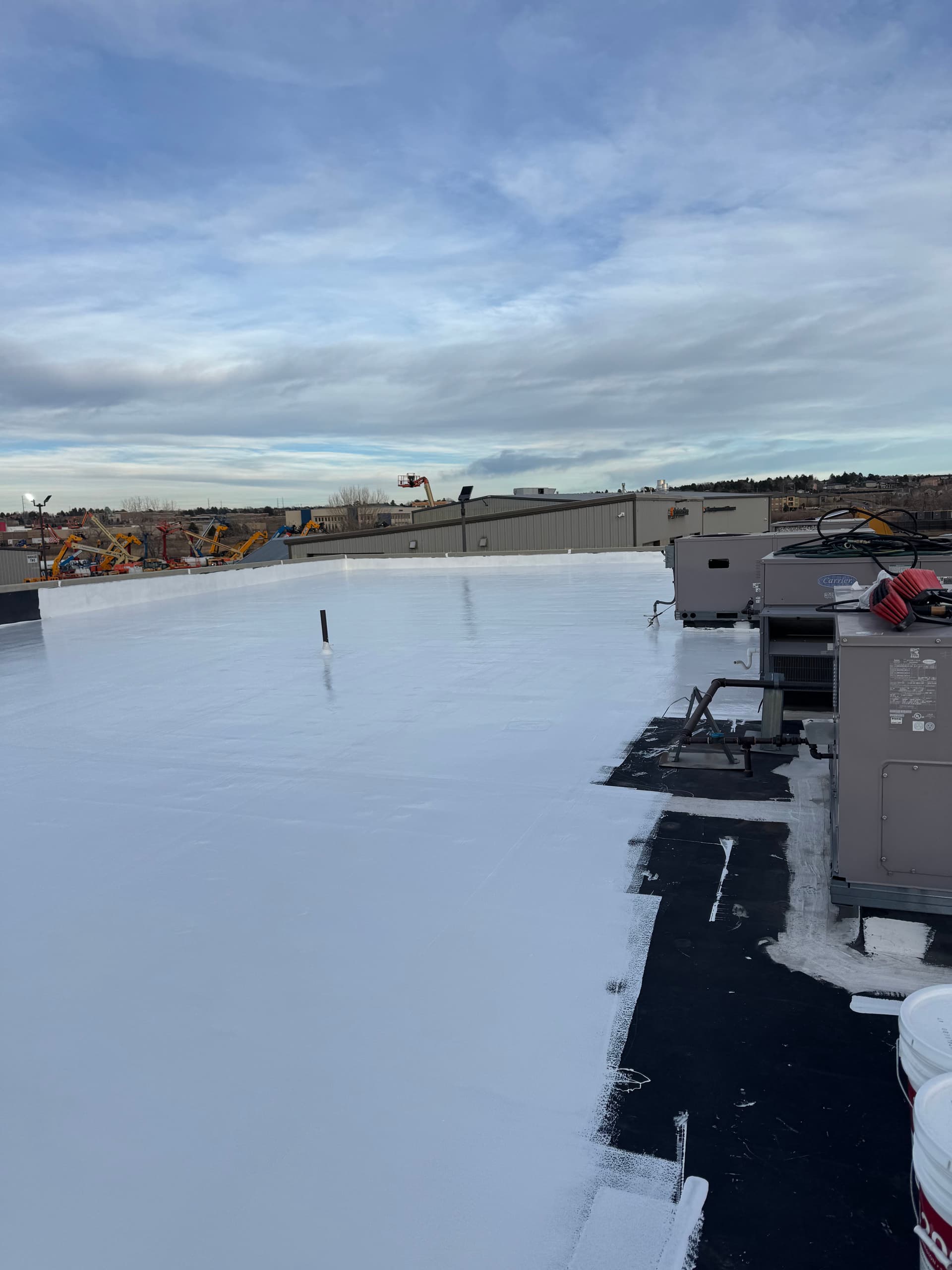 Gallery photos for Silicone Roof Coating Stops Multiple Leaks at Equipment Share HQ: Image #8